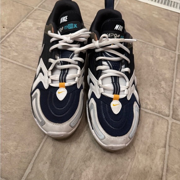 Nike Air Max Plus in Black, White, and Orange - Picture 2 of 6